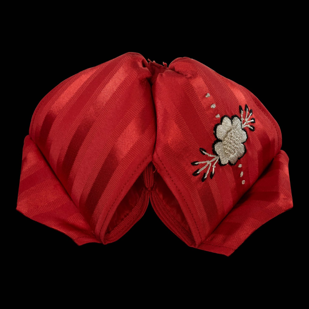 Single detail "De Gallo" Moño